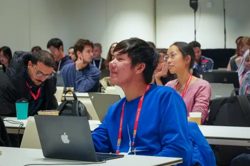 Happy student paying attention to a lecture